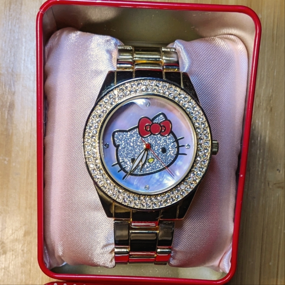 Hello kitty Sanrio Watch Rose Gold With A Mother Of Pearl Facing!